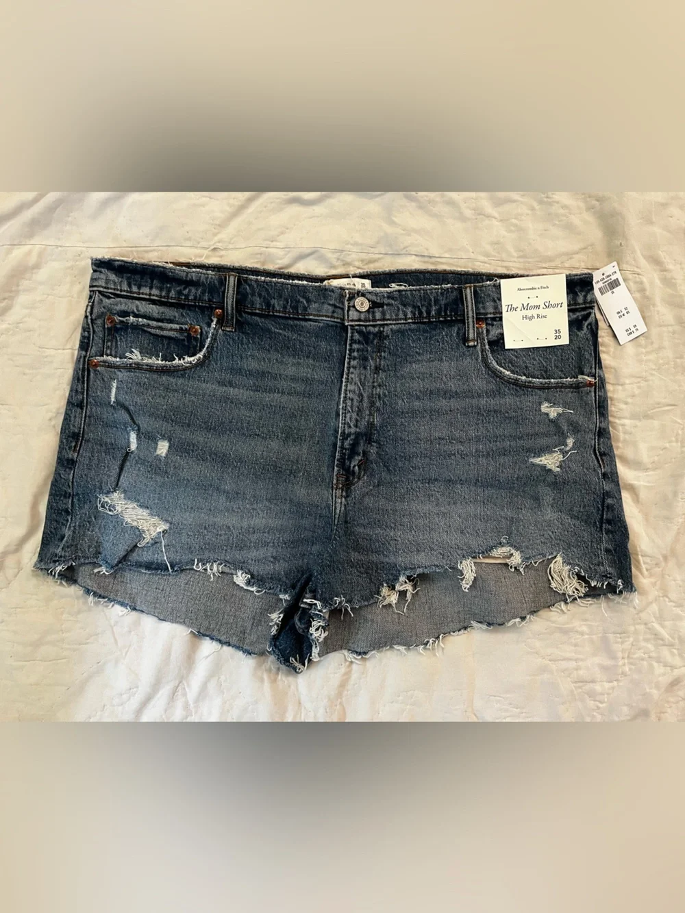 Abercrombie & Fitch Distressed Dark Blue Jean “The Mom Short” High-Rise